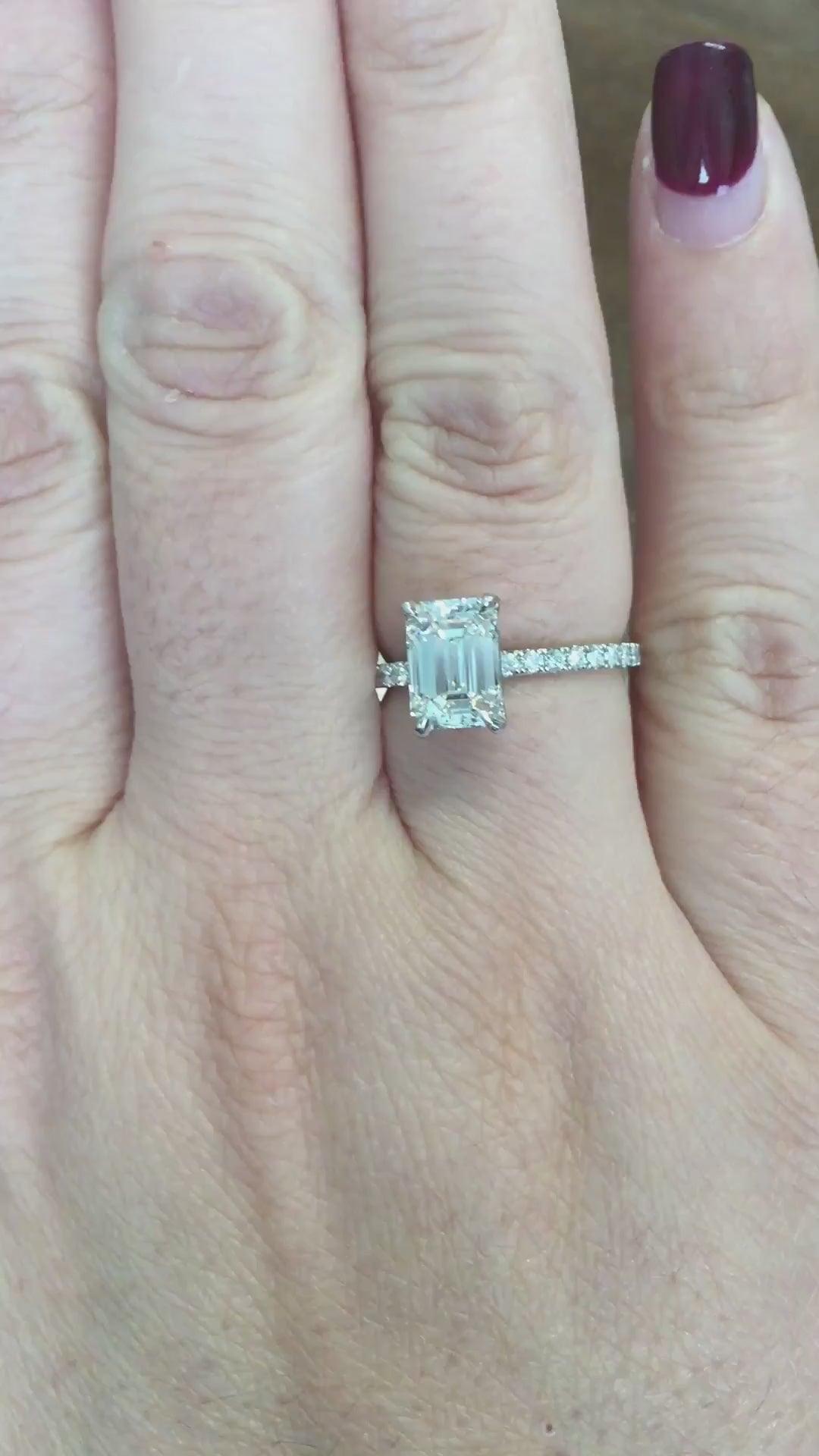 caption:Shown with 1.6ct emerald cut diamond in platinum