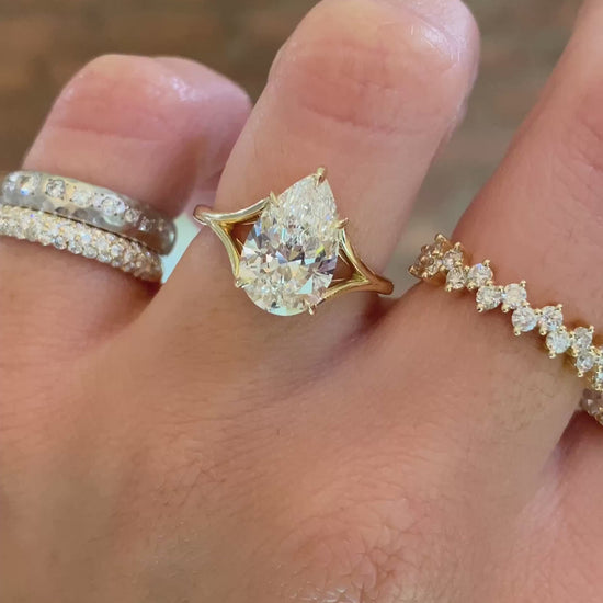 caption:Shown with 2.5ct pear in 14k yellow gold 