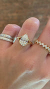 caption:Shown with 2.5ct pear in 14k yellow gold 
