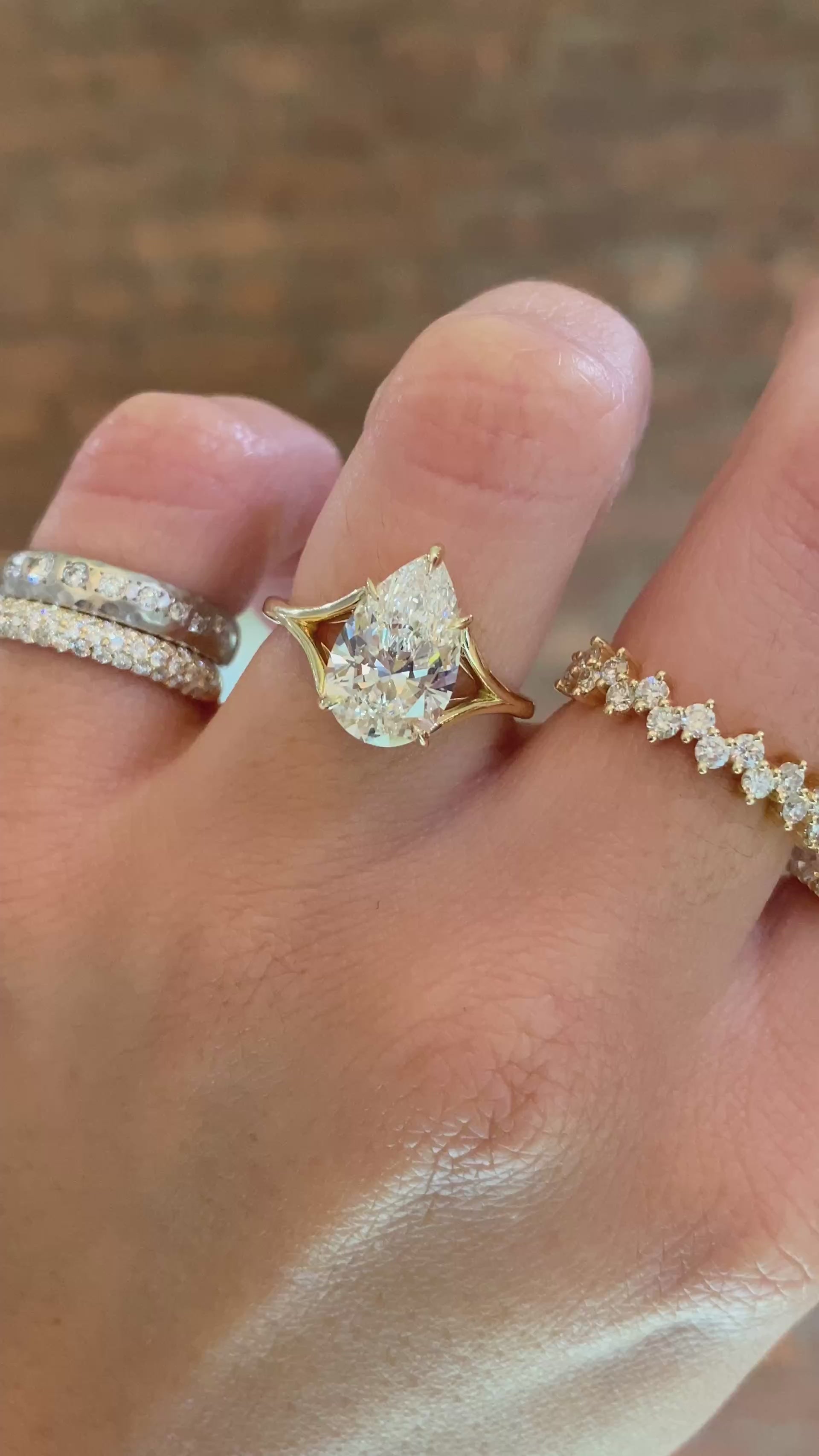 caption:Shown with 2.5ct pear in 14k yellow gold 