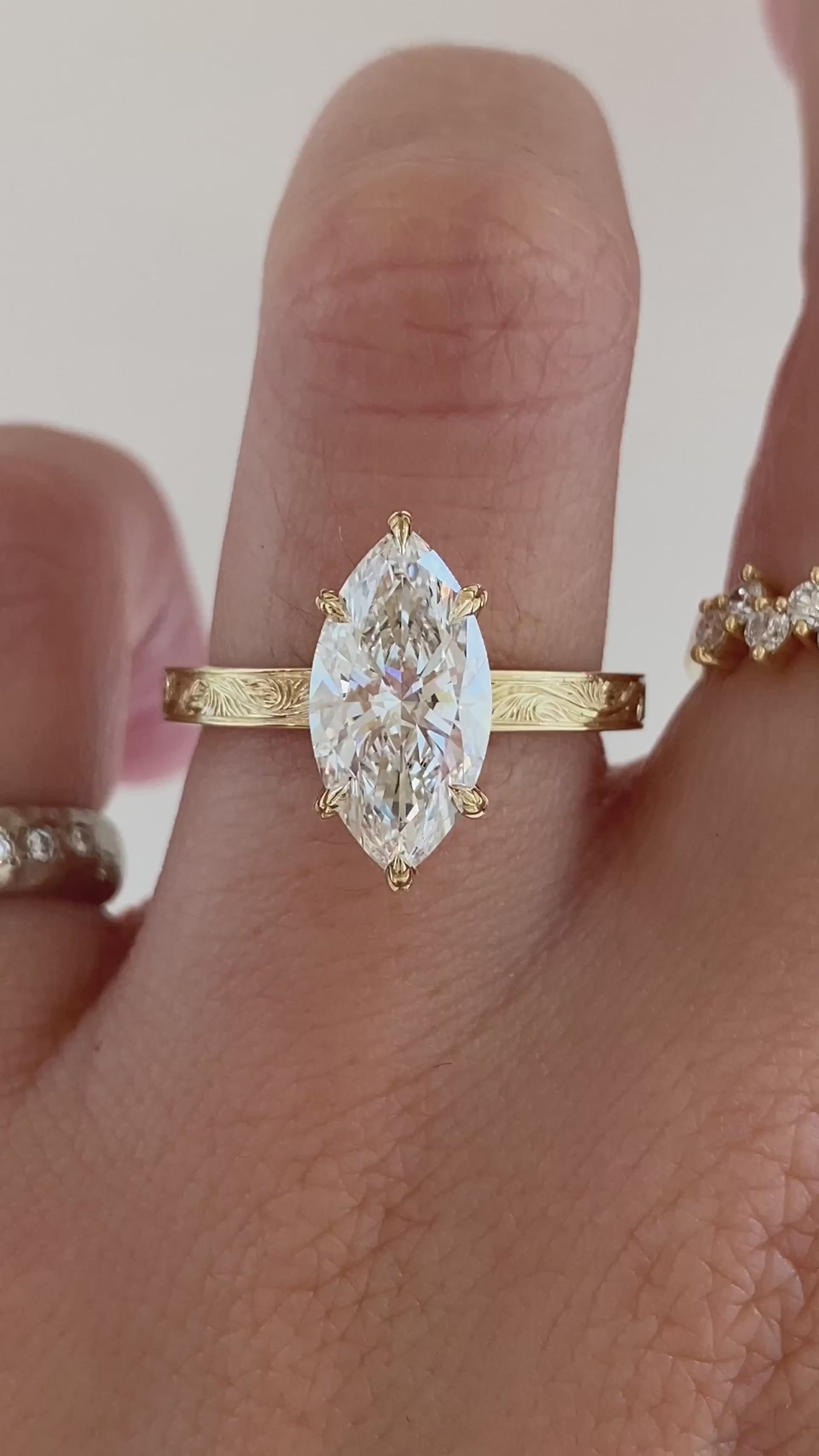 caption:Shown with 2ct marquise in 14k yellow gold 