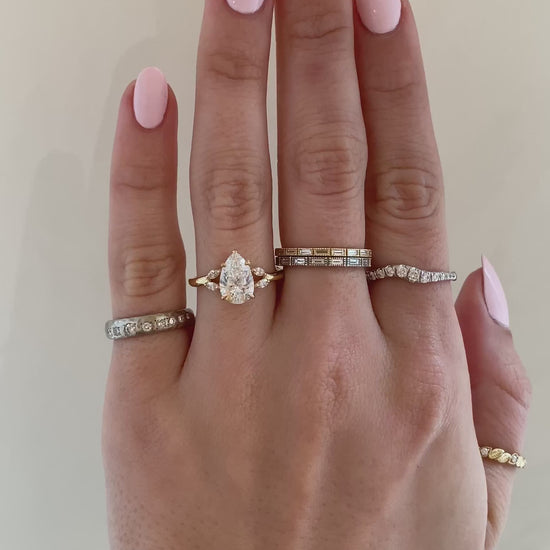 caption:Shown with 2ct pear in 14k yellow gold 