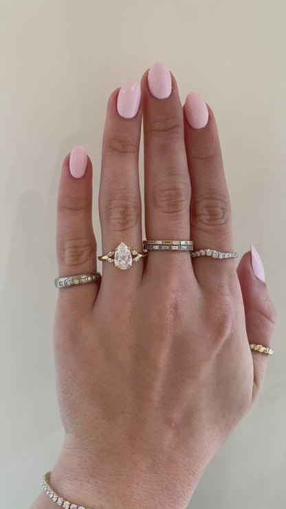 caption:Shown with 2ct pear in 14k yellow gold 