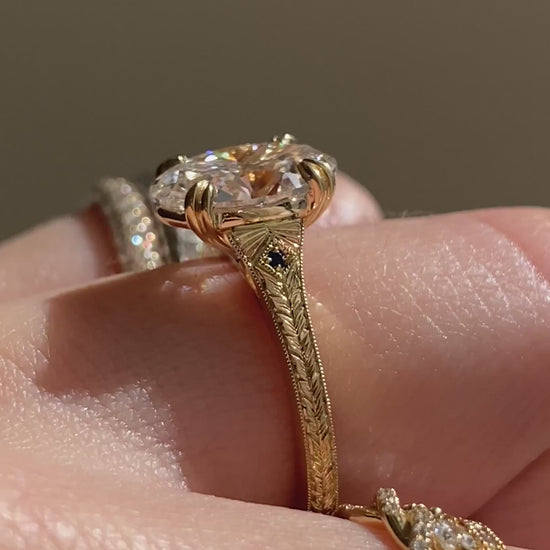 caption:Shown with 2.5ct oval in 14k yellow gold