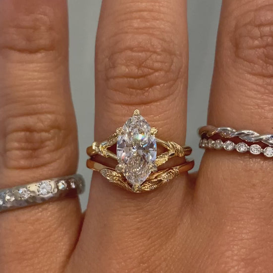 caption:Stacked with Pembroke - Marquise engagement ring in 14k rose gold