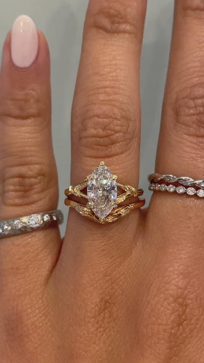 caption:Stacked with Pembroke - Marquise engagement ring in 14k rose gold