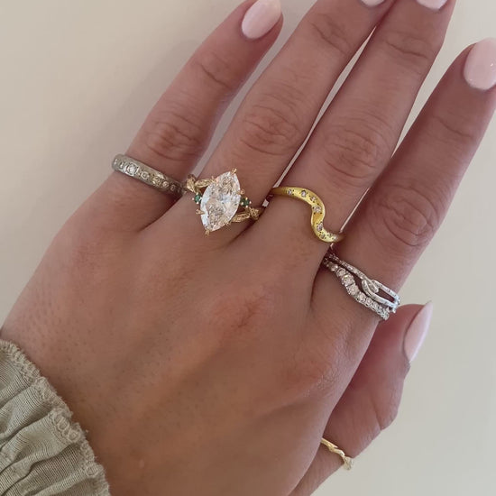 caption:Shown with 3ct marquise diamond in 14k yellow gold 