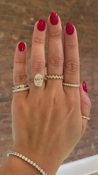 caption:Shown with 3ct oval in 14k yellow gold 