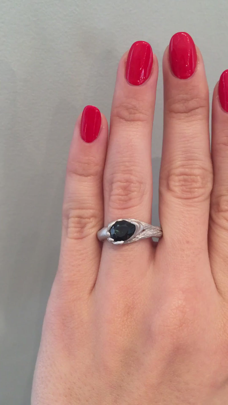caption:Shown with 2ct pear sapphire in platinum