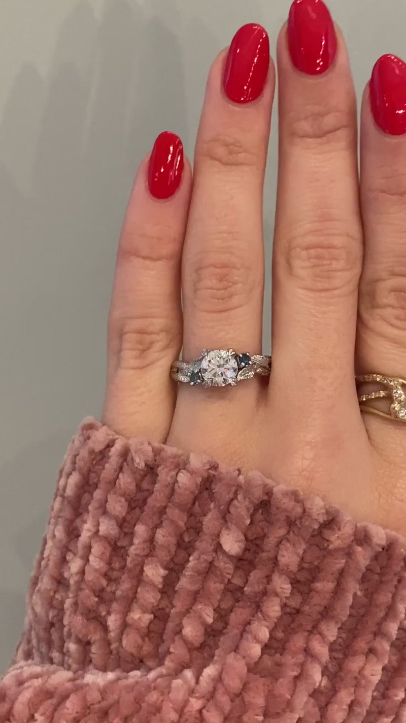 caption:Customized with black diamond side stones in platinum 