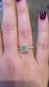 caption:Shown with emerald cut rustic diamond in 14k yellow gold
