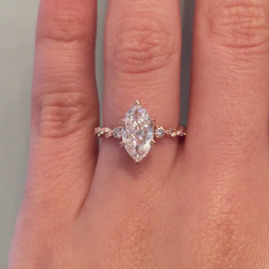 caption:Shown with 1.5ct marquise diamond in 14k rose gold