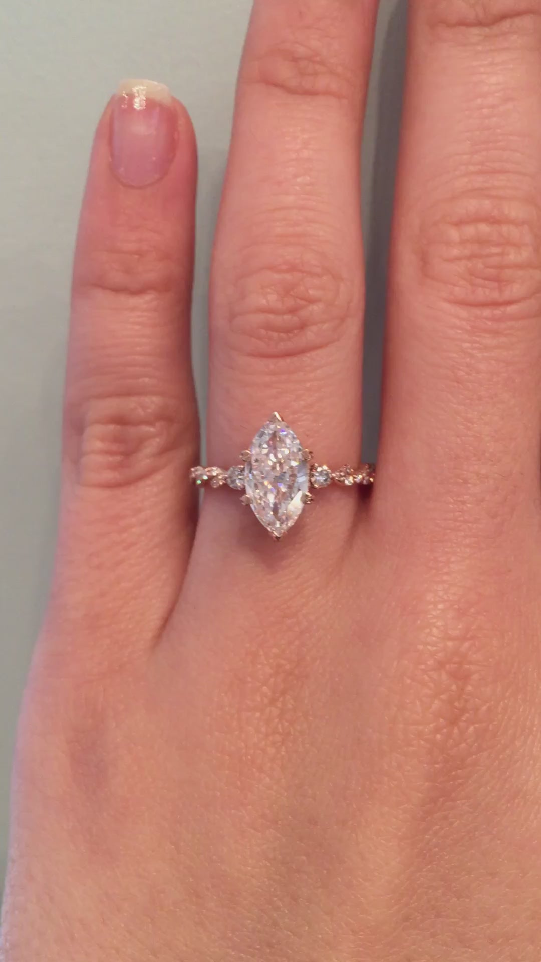 caption:Shown with 1.5ct marquise diamond in 14k rose gold