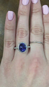 caption:Shown with oval blue sapphire in platinum