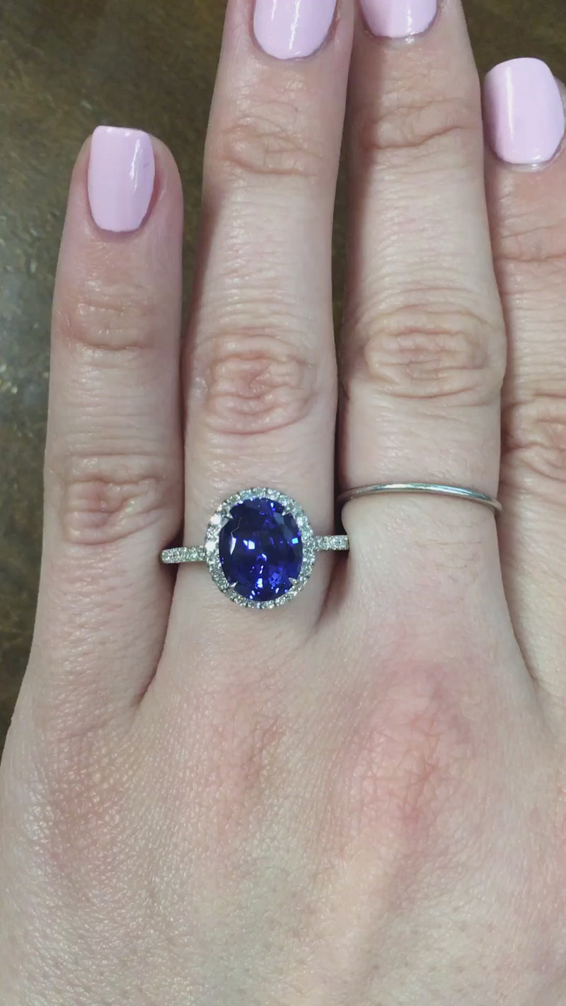 caption:Shown with oval blue sapphire in platinum