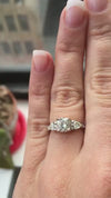 caption:Shown with cushion cut diamond in platinum