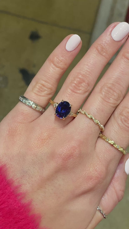 caption:Shown with 3.7ct oval blue sapphire in 14k yellow gold