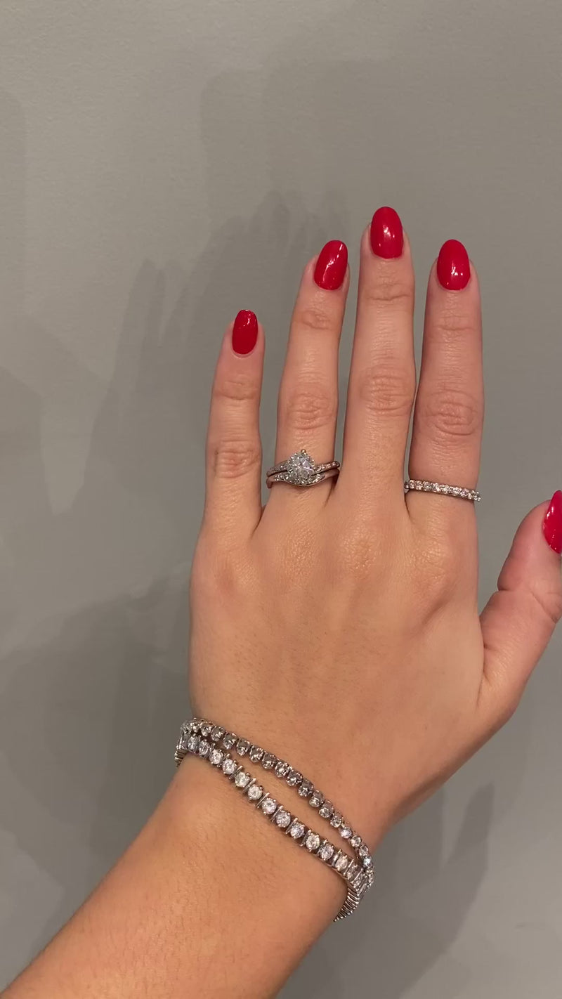caption:Shown with Aurora Diamonds engagement ring