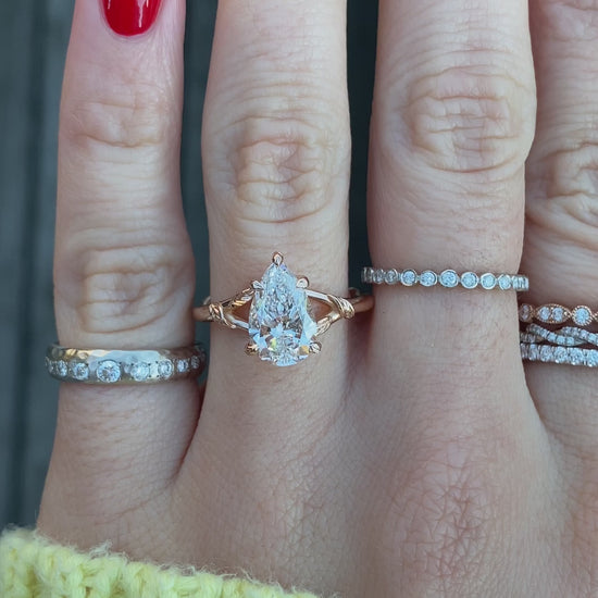 caption:Shown with 2ct pear diamond set in 14k rose gold