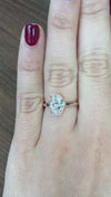 caption:Shown with 1.5ct oval diamond in 14k rose gold