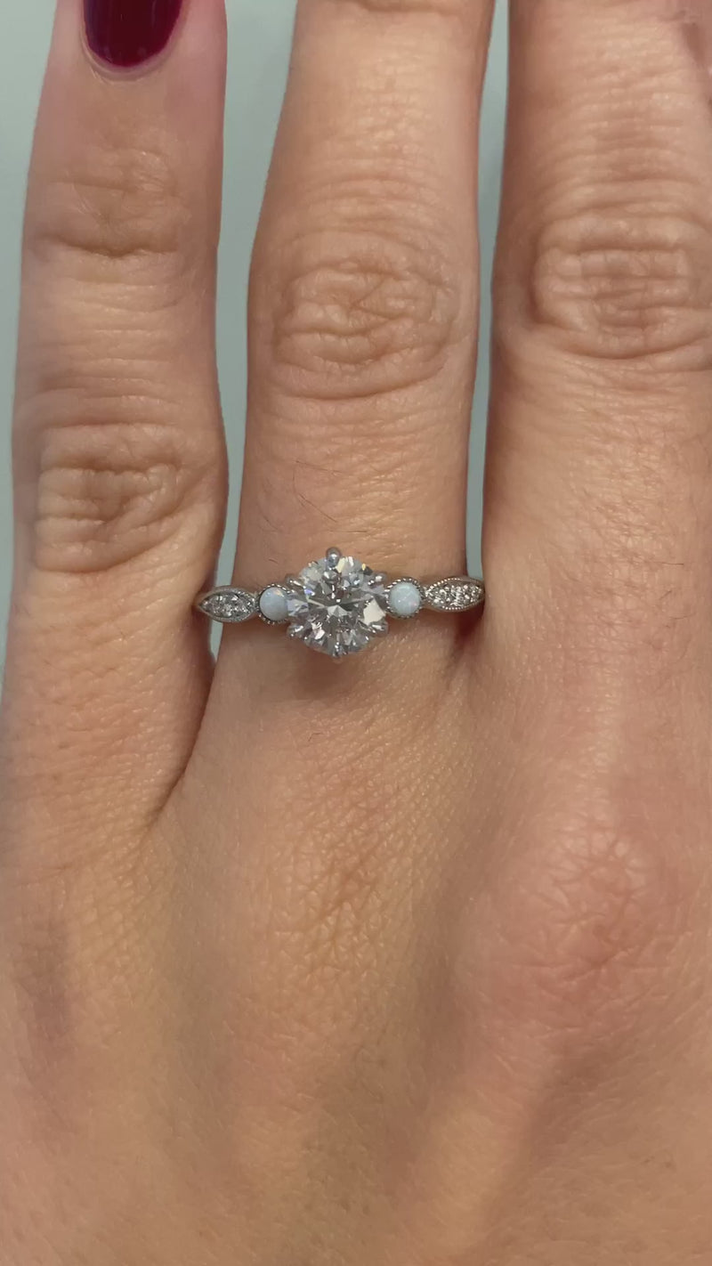 caption:Shown with 0.9ct round diamond in platinum
