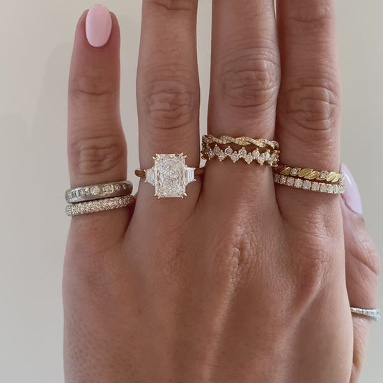 caption:Shown with 3ct radiant cut diamond in 14k yellow gold