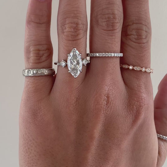 caption:Shown with 3ct marquise in all platinum