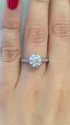 caption:Shown with 1.50ct round cut diamond in platinum
