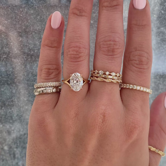 caption:Shown with 2.5ct oval in 18k rose gold, customized with leaf prongs