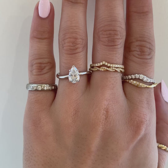 caption:Shown with 1ct pear diamond in white gold 