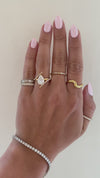caption:Shown with 2ct pear in 18k yellow gold