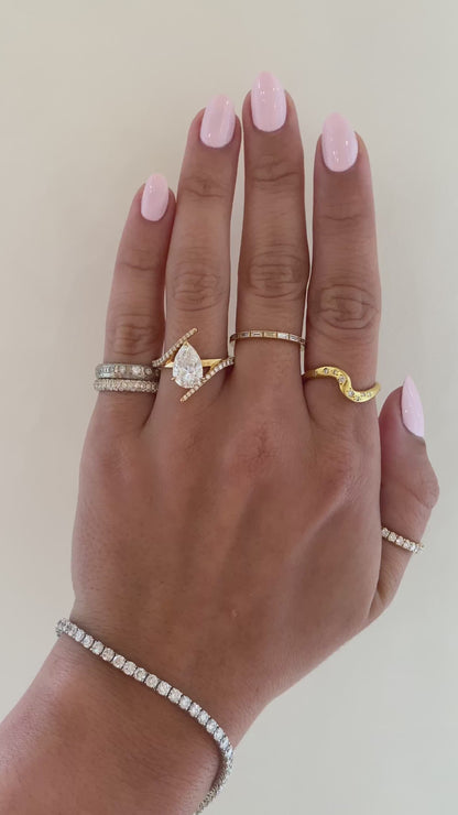 caption:Shown with 2ct pear in 18k yellow gold