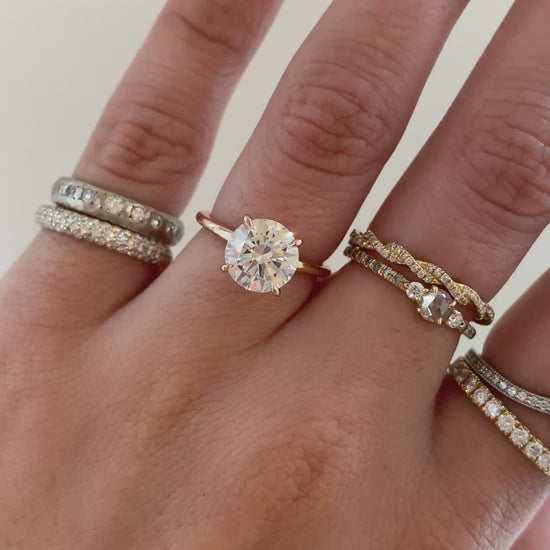 caption: Shown with 2ct round diamond in 14k rose gold