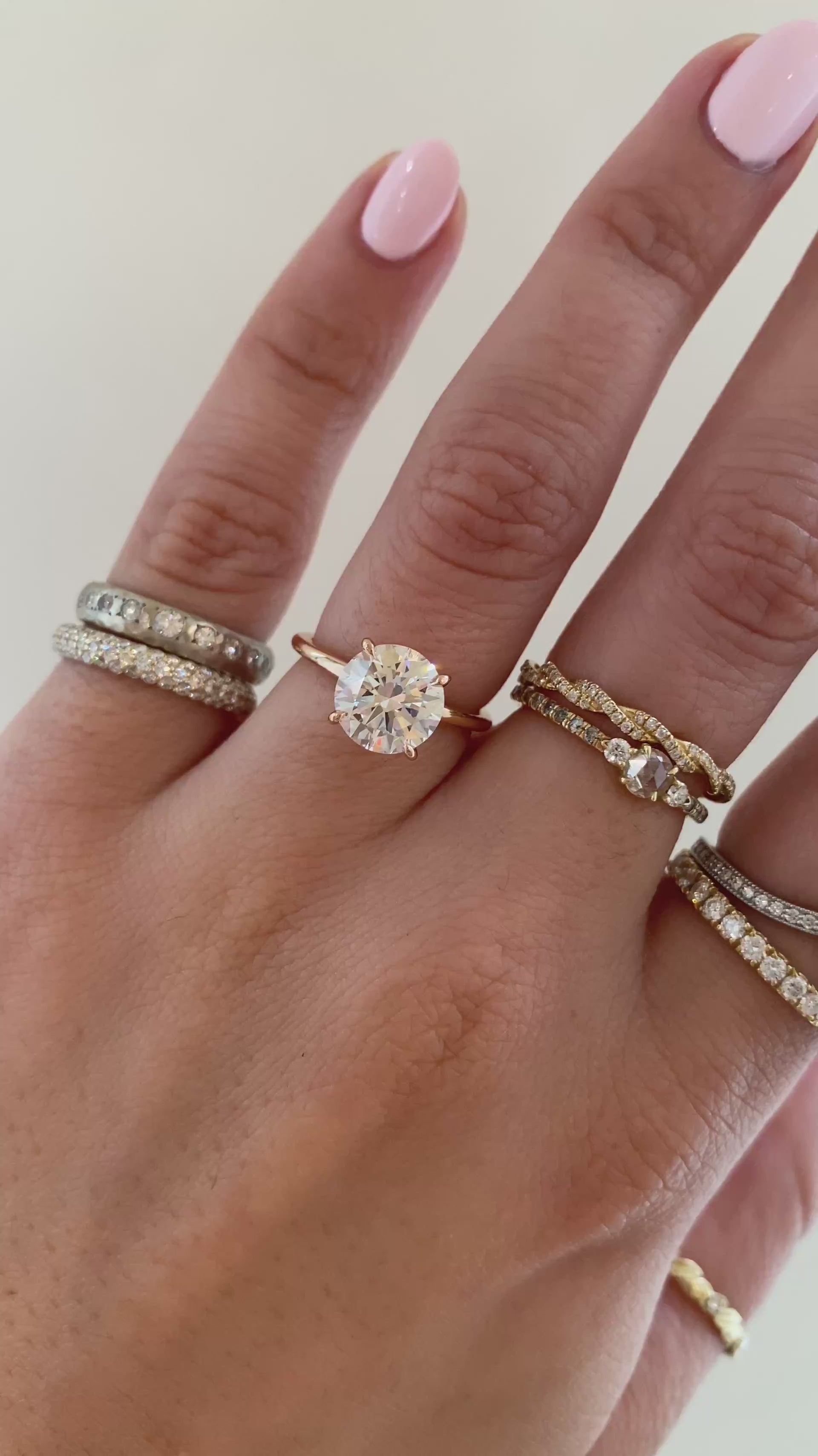 caption: Shown with 2ct round diamond in 14k rose gold