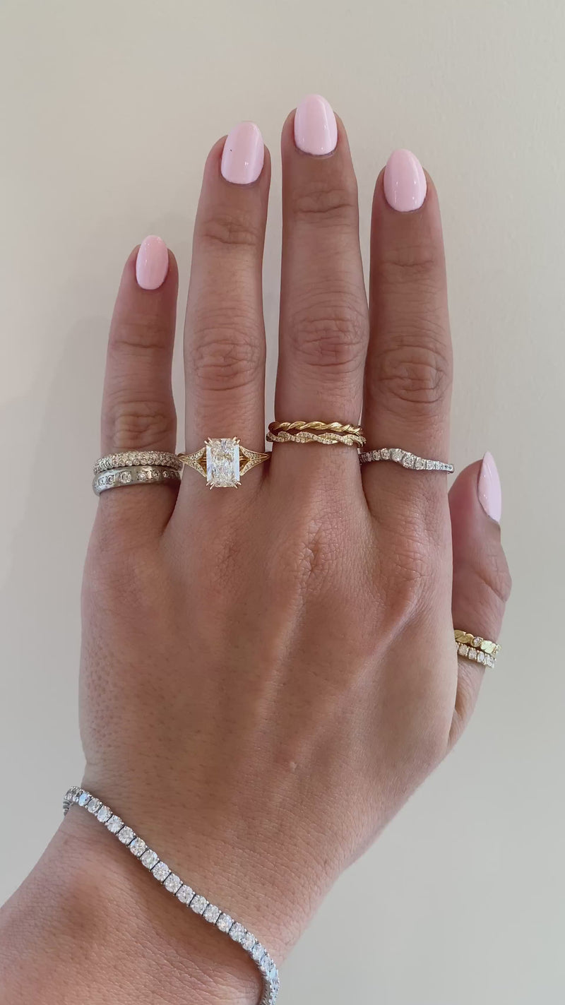 caption:Shown with 2.5ct radiant cut in 18k yellow gold