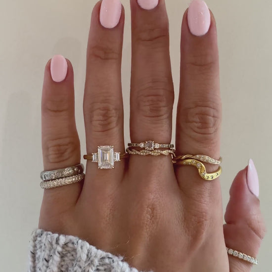 caption:Shown with 2ct emerald cut in 14k yellow gold