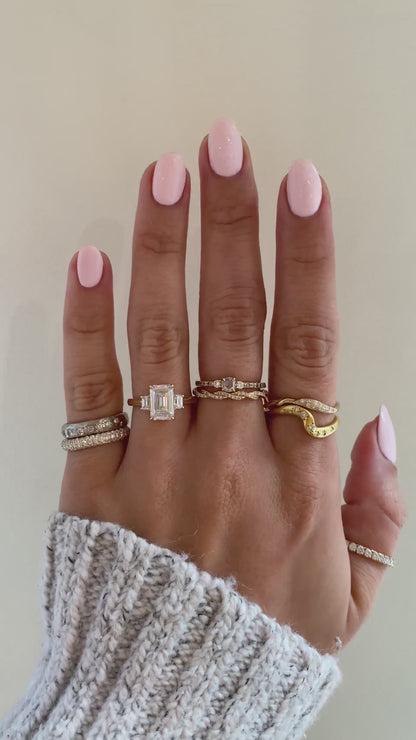 caption:Shown with 2ct emerald cut in 14k yellow gold