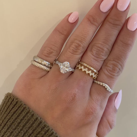 caption:Shown with 1.55ct oval in platinum