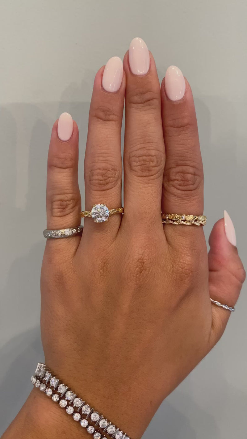 caption:Shown with 1.5ct round diamond in 18k yellow gold