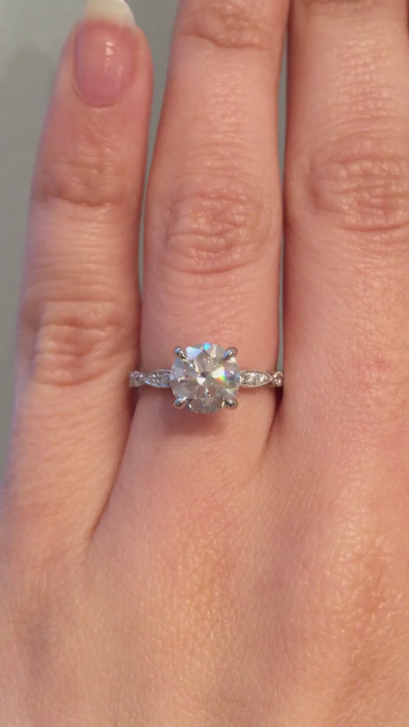 caption:Customized with 1.5ct round moissanite in platinum