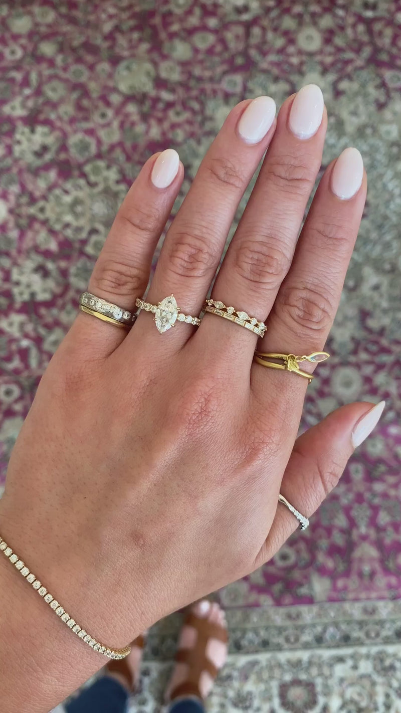 caption:Shown with 1.27ct marquise diamond in 14k yellow gold