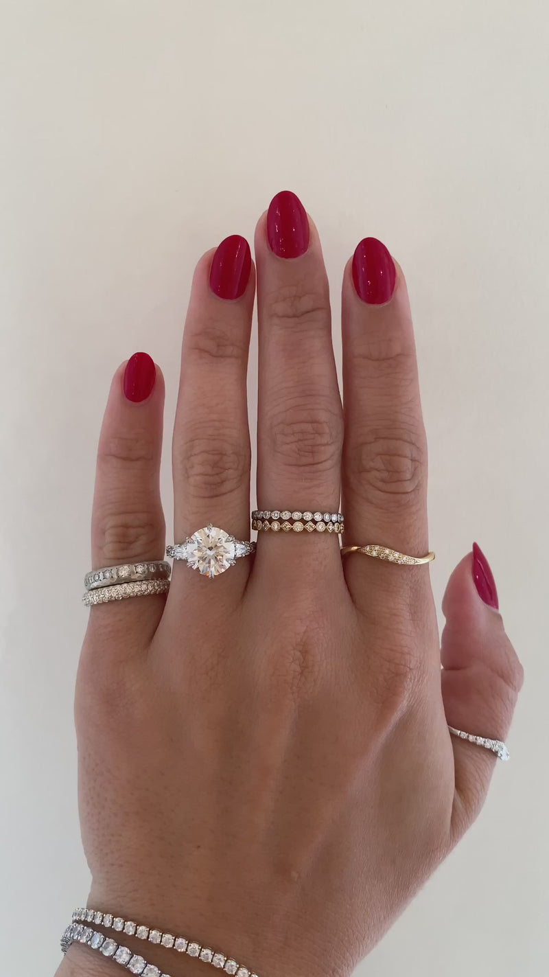 caption:Shown with 3ct round diamond in platinum