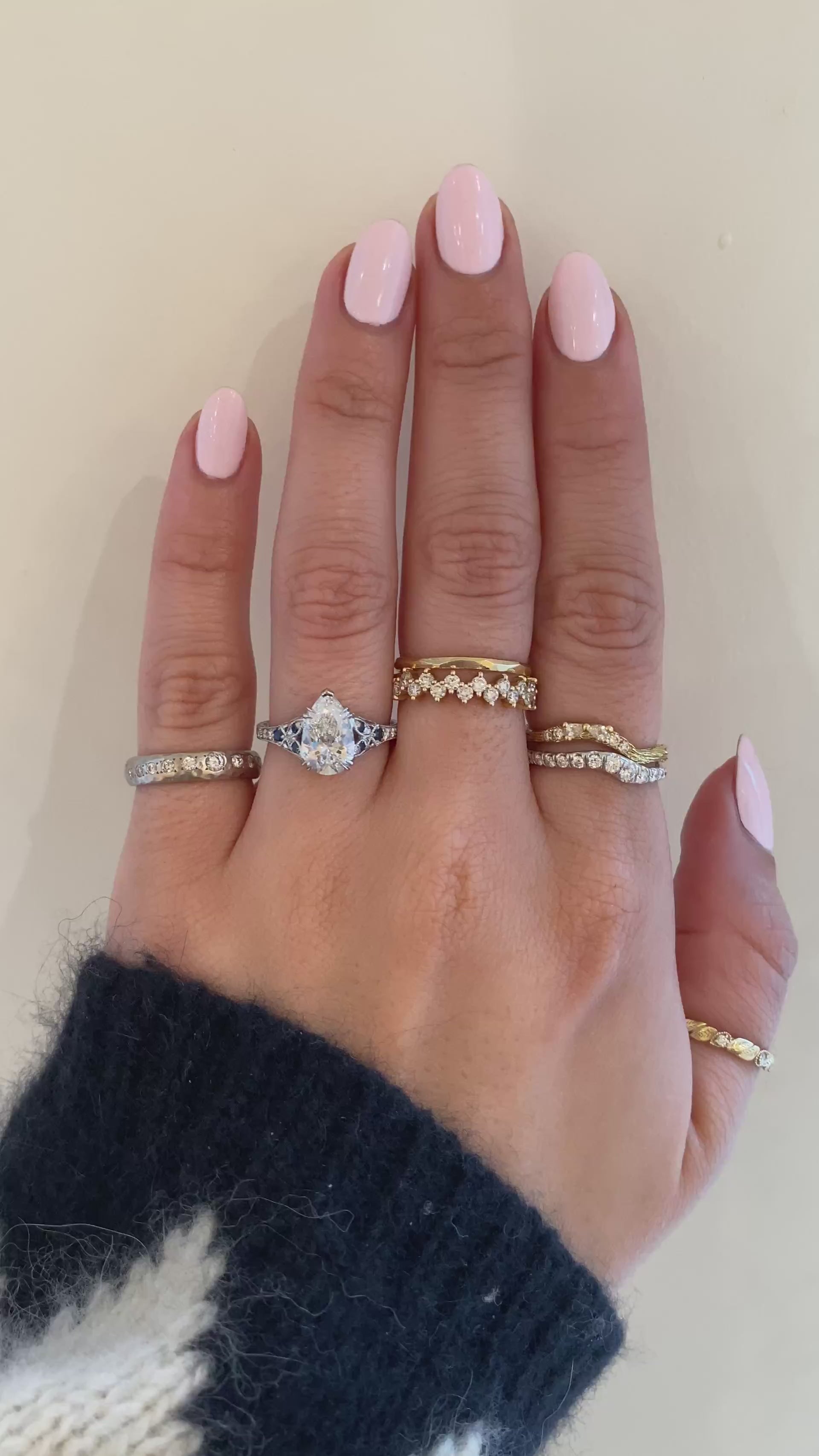 caption:Shown with a 2ct pear in platinum