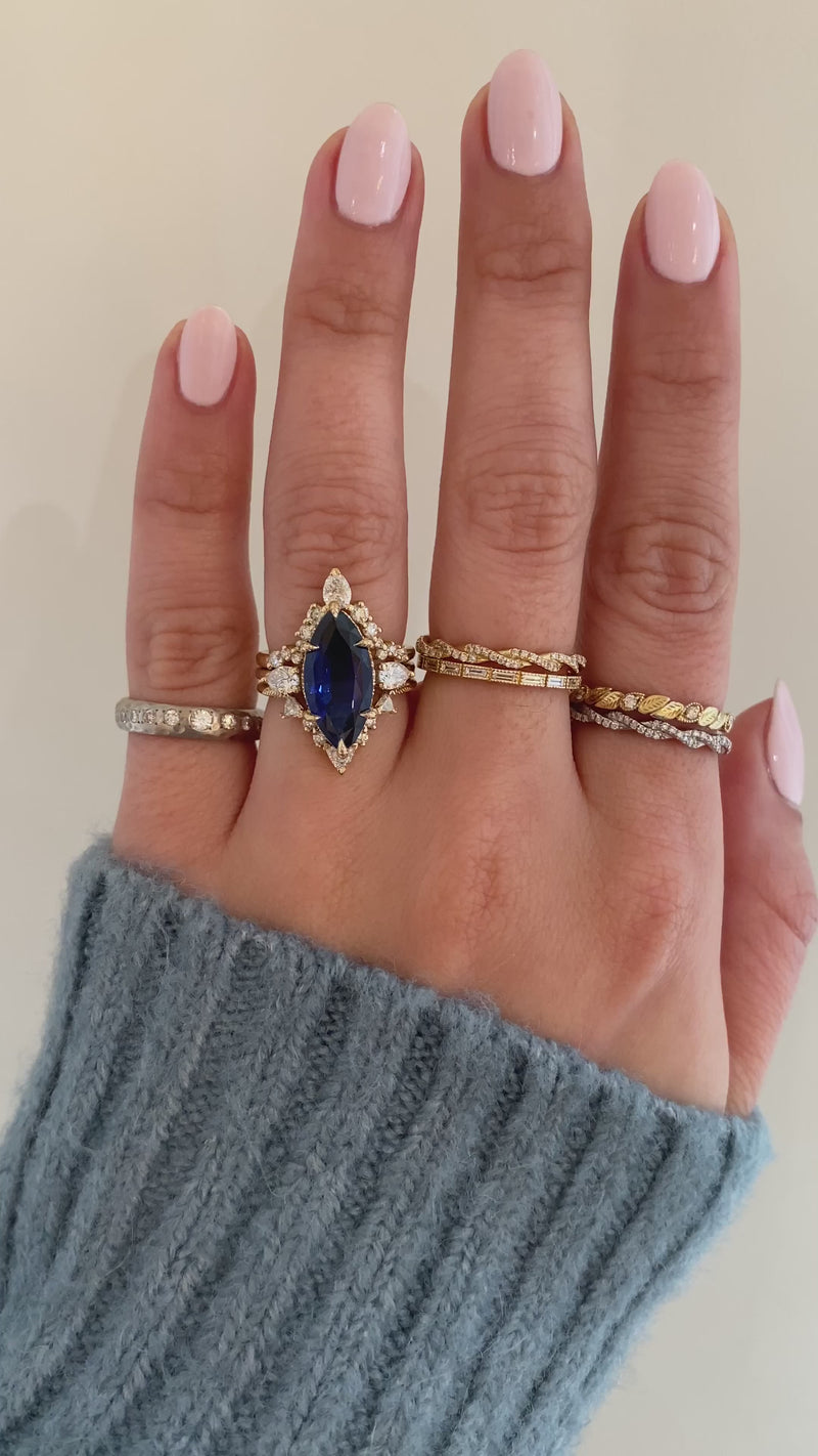 caption:Stacked with custom Laxmie & Kya wedding bands