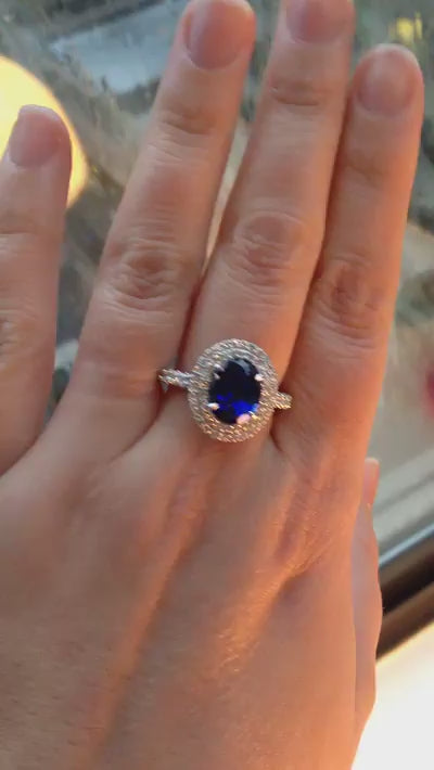 caption:Shown with 3.75ct oval sapphire in platinum