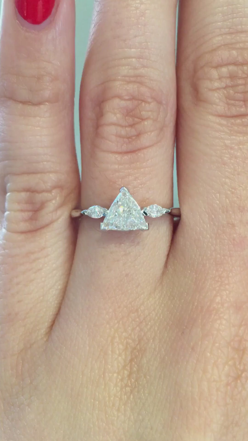 caption:Shown with 0.70ct trillion cut diamond in platinum 