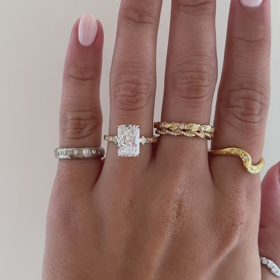 caption:Shown with 3ct radiant cut in 14k yellow gold 
