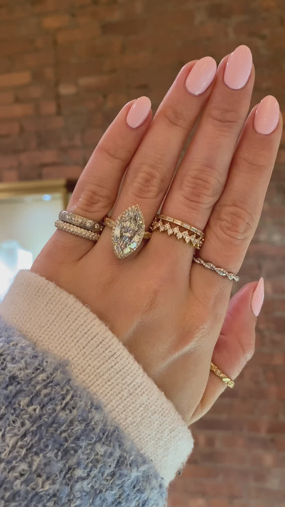 caption:Shown with 5ct marquise in 14k yellow gold