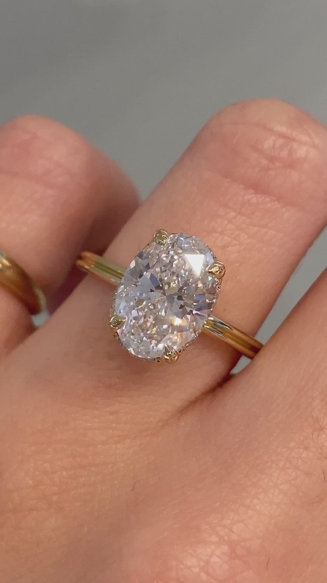 caption:Shown with 3ct oval diamond in 14k yellow gold 