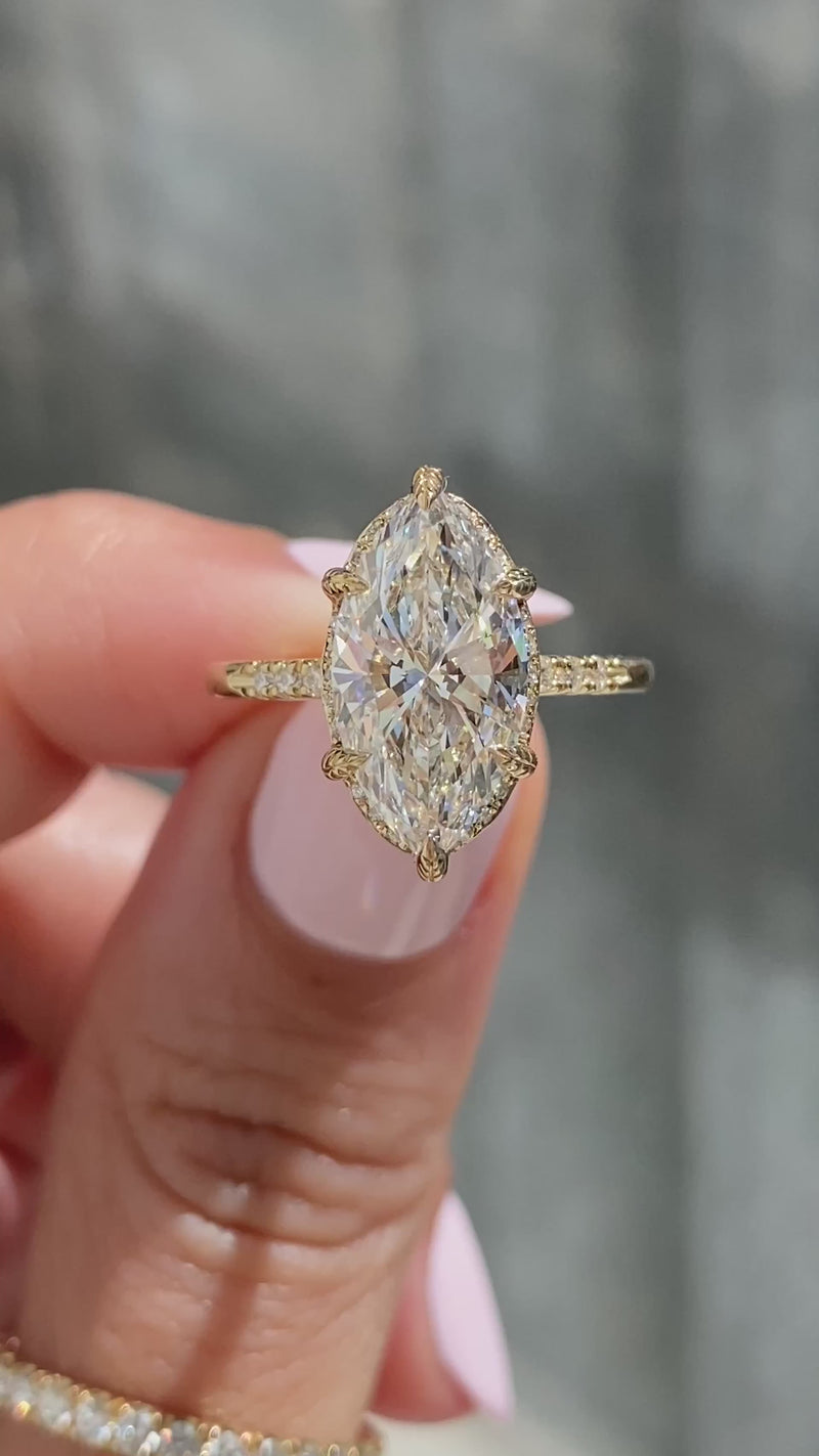 caption:Shown with 3ct marquise diamond in 14k yellow gold